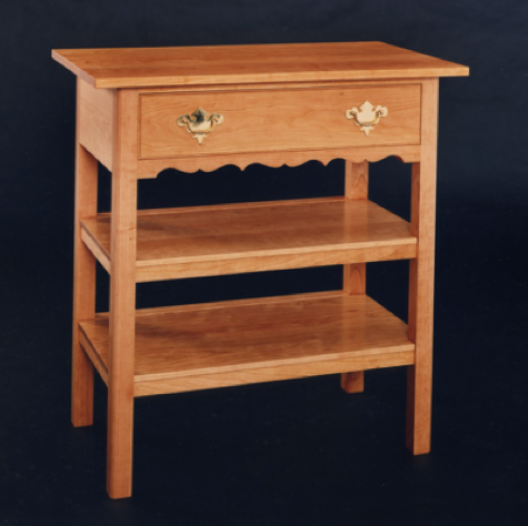 A country Georgian side table in cherry. A country Georgian side table in cherry.